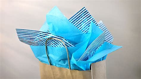 How to Put Paper in Gift Bag: A Symphony of Chaos and Order